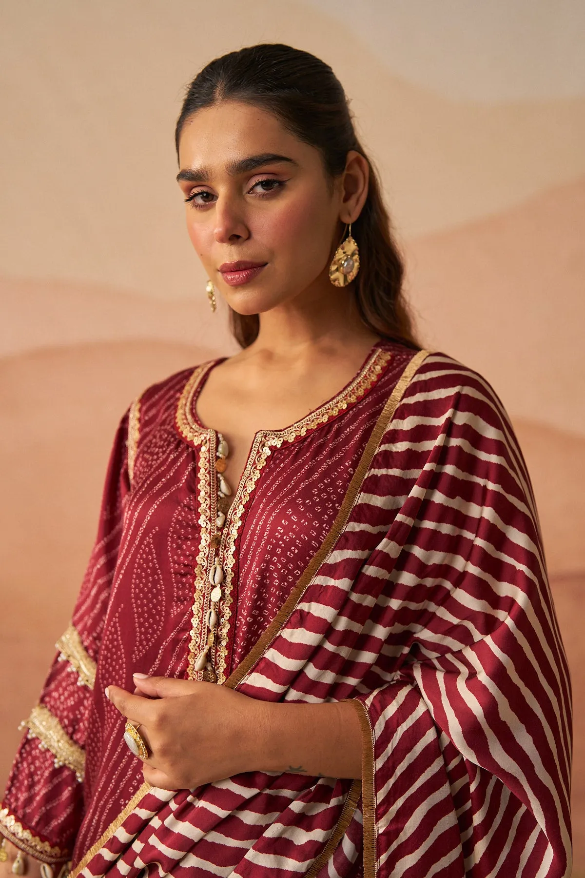 Red Leheriya Bandhani Suit With Potli And Dupatta